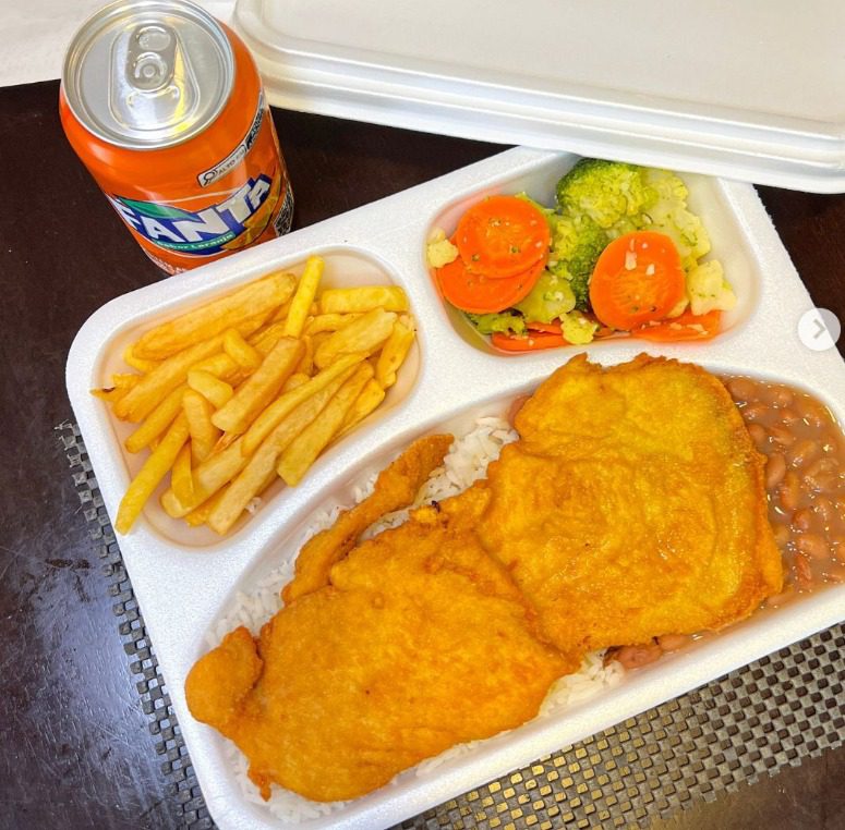 Marmita G, mais refrigerante lata fanta laranja (gelado)